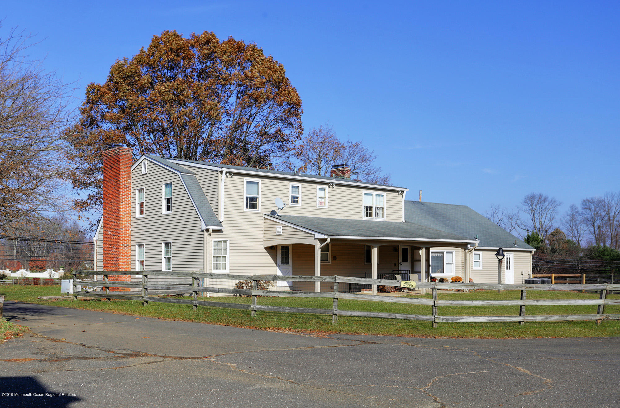 250 Newman Springs Road Colts Neck, NJ 07722 - Photo 26 of 43 a front view of a house with a yard and porch