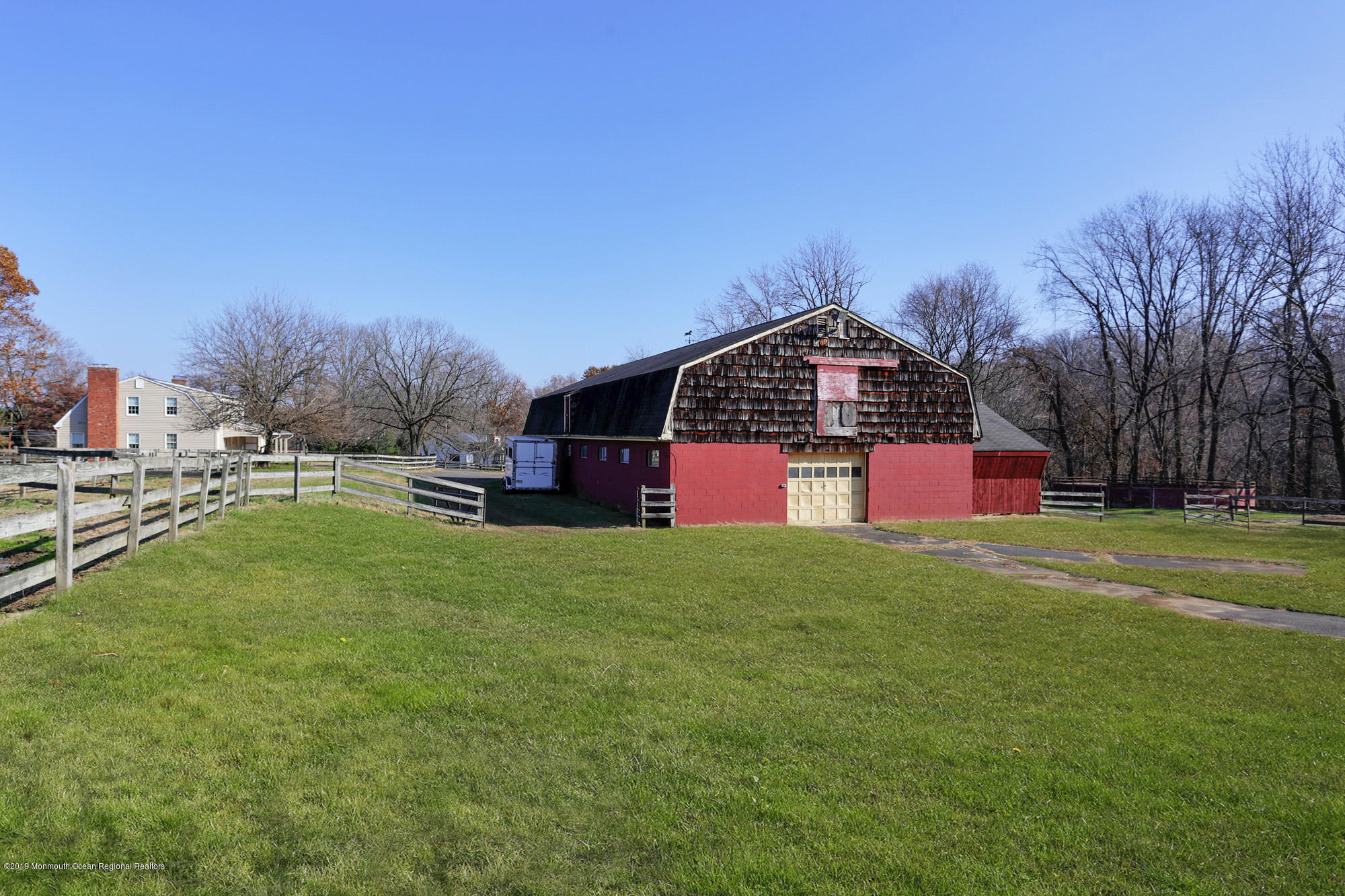 250 Newman Springs Road Colts Neck, NJ 07722 - Photo 30 of 43 a front view of a house with garden