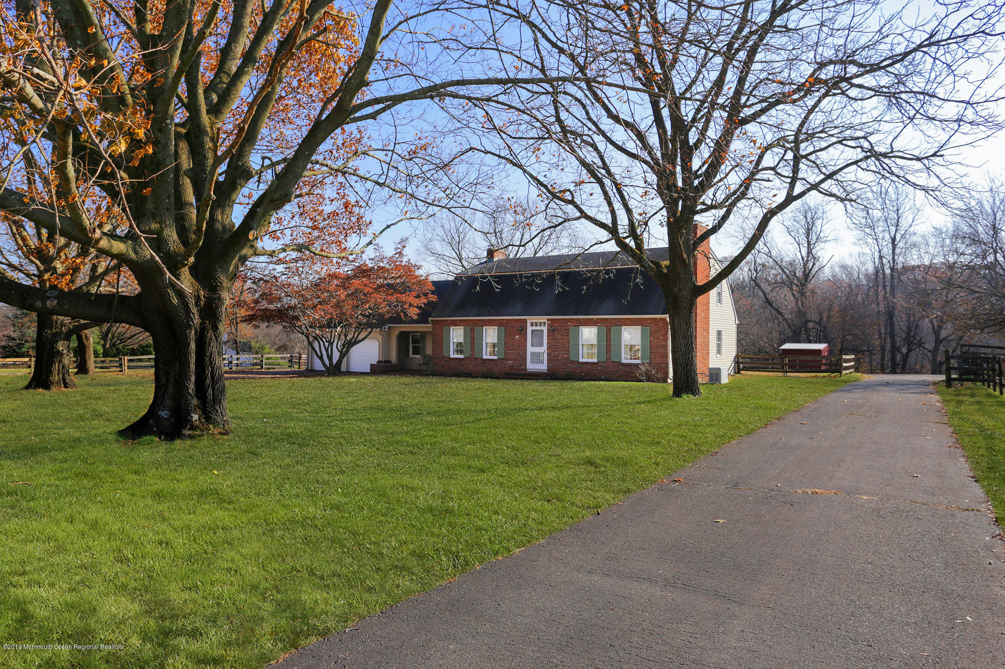250 Newman Springs Road Colts Neck, NJ 07722 - Photo 3 of 43 a view of a trees in front of a house