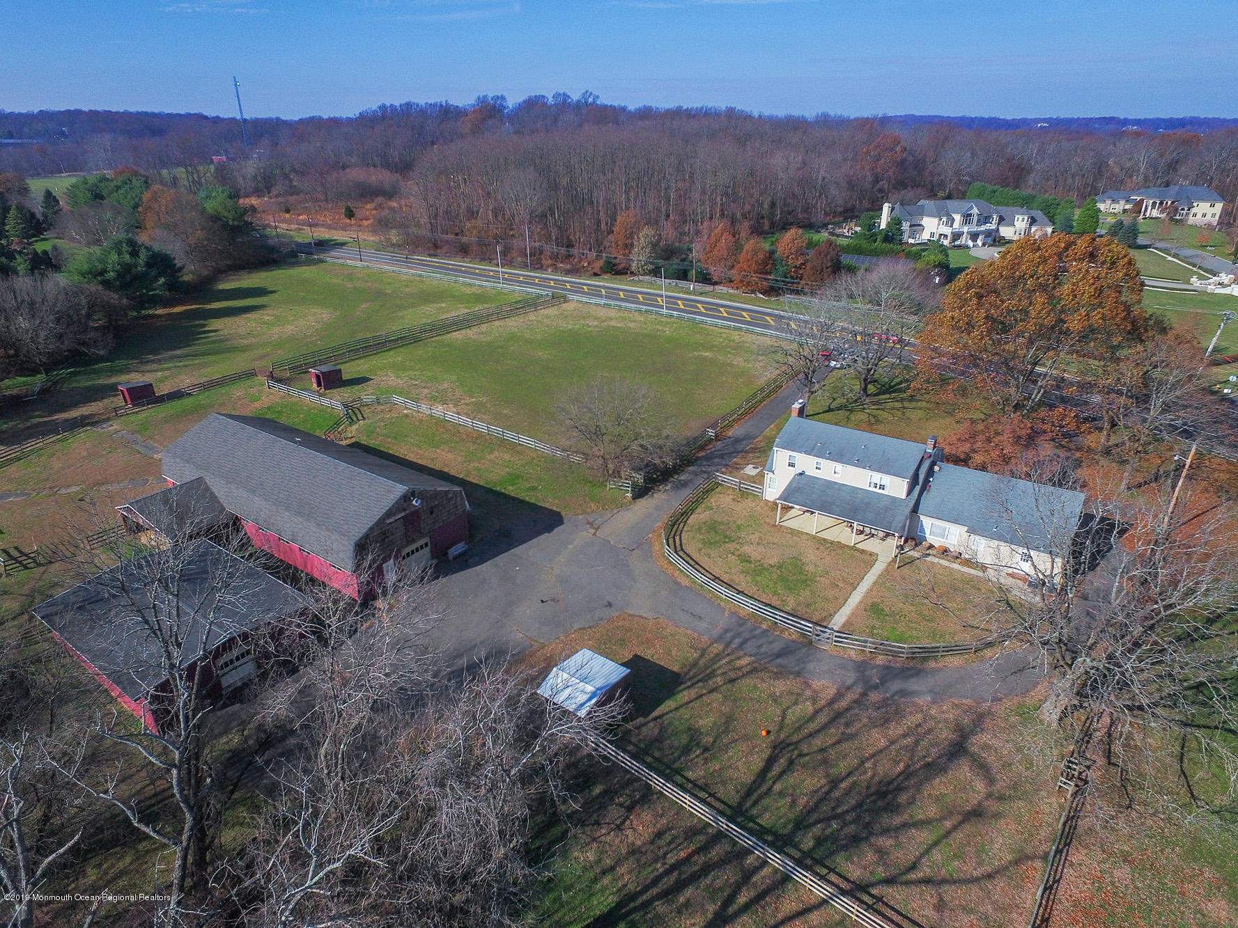 250 Newman Springs Road Colts Neck, NJ 07722 - Photo 34 of 43 an aerial view of a house with a yard