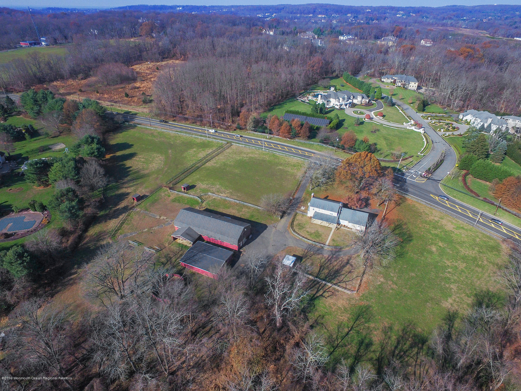 250 Newman Springs Road Colts Neck, NJ 07722 - Photo 35 of 43 an aerial view of a house with a yard