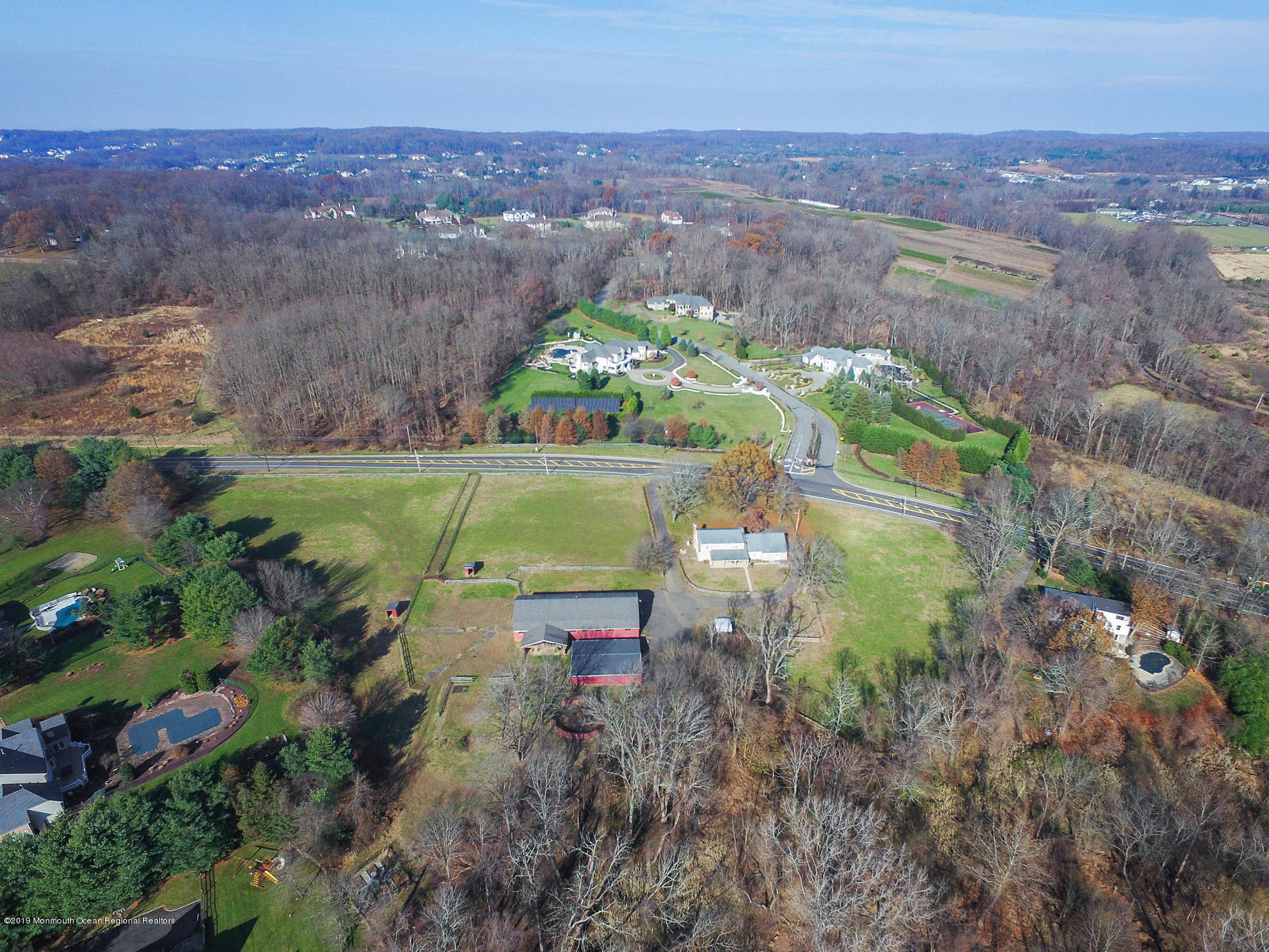 250 Newman Springs Road Colts Neck, NJ 07722 - Photo 37 of 43 an aerial view of a houses with a yard