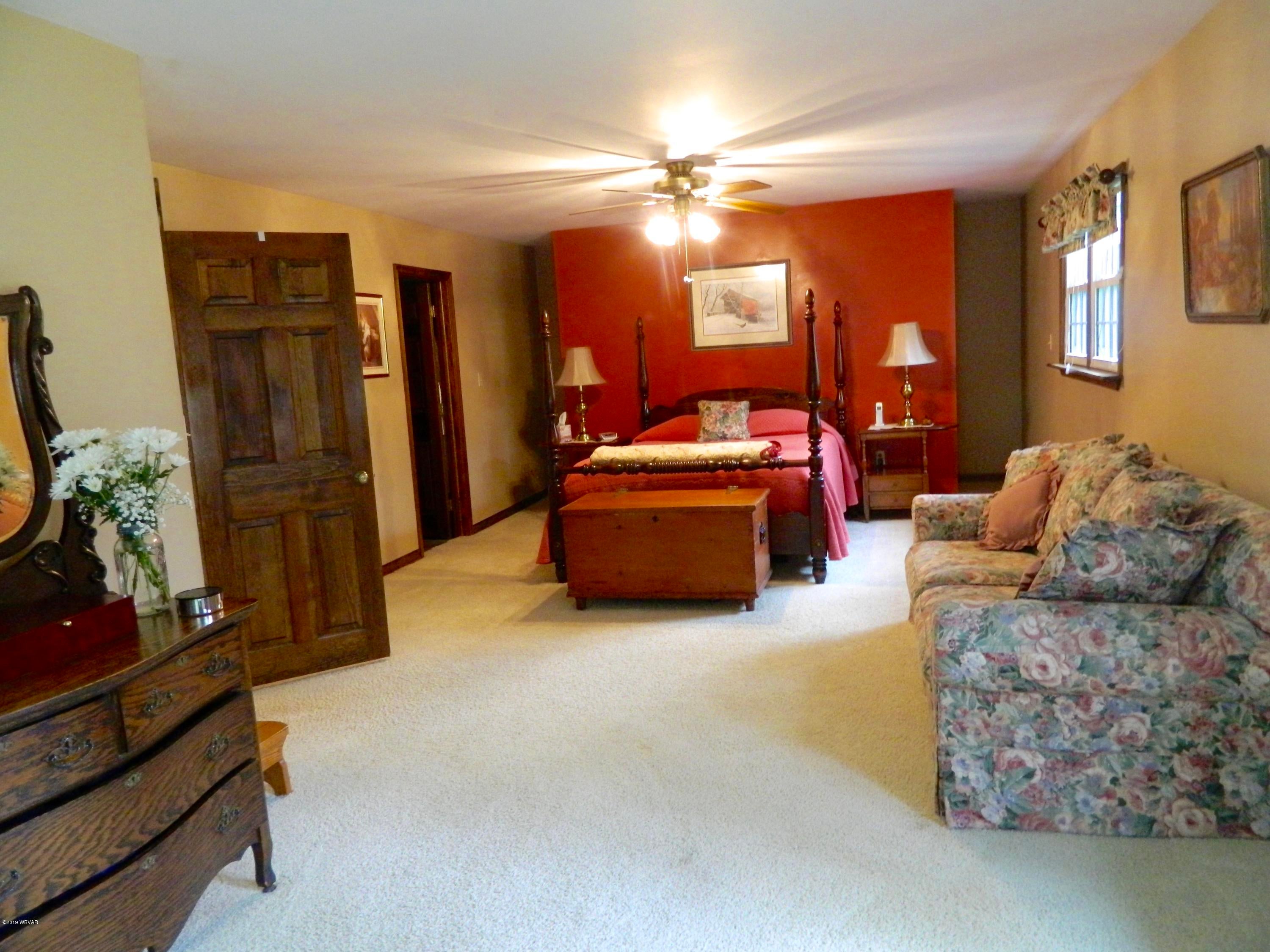 288 Rock Ledge Road Dushore, PA 18614 - Photo 16 of 42 Walk-In Closet behind Headboard