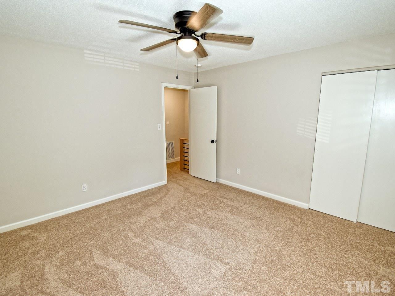 1120 Nottingham Circle Cary, NC 27511 - Photo 13 of 22 a view of a room with a ceiling fan