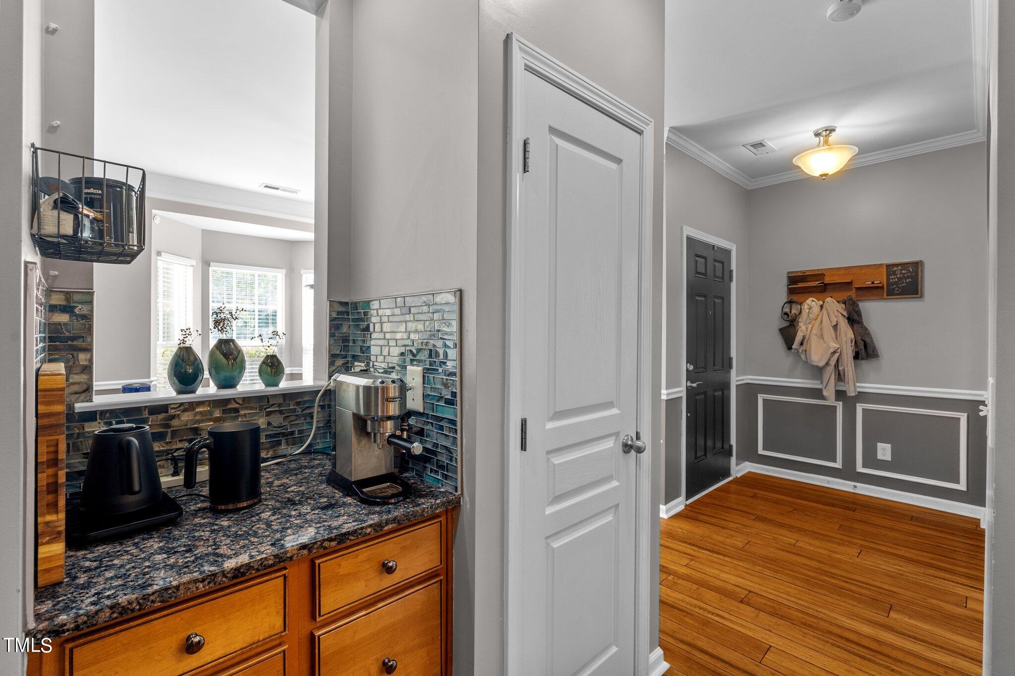 5016 Paperbark Court Durham, NC 27713 - Photo 12 of 35 a kitchen with stainless steel appliances granite countertop a stove and a sink