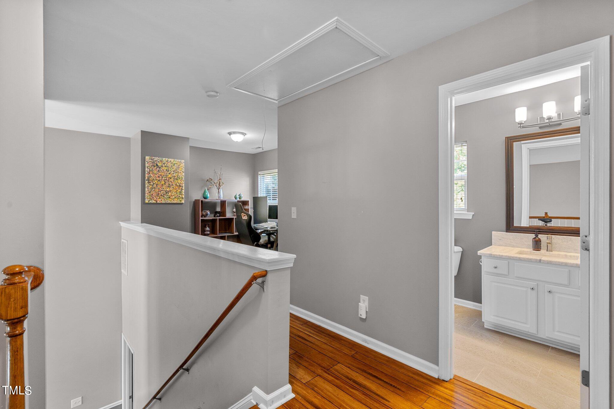 5016 Paperbark Court Durham, NC 27713 - Photo 18 of 35 a view of a kitchen from the hallway
