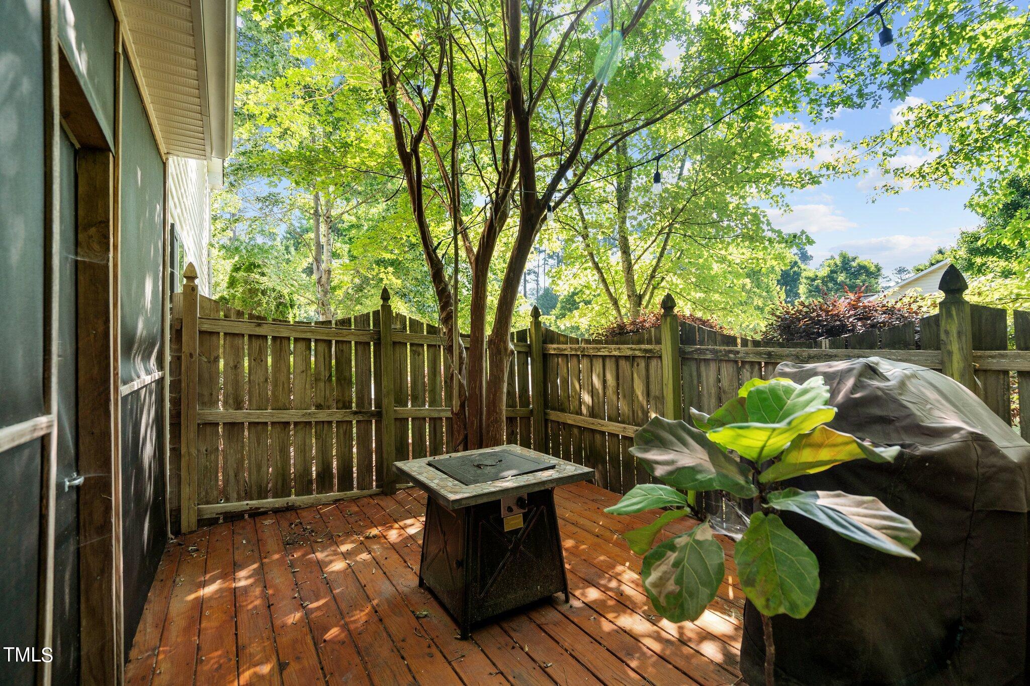 5016 Paperbark Court Durham, NC 27713 - Photo 34 of 35 a view of a bench with wooden floor