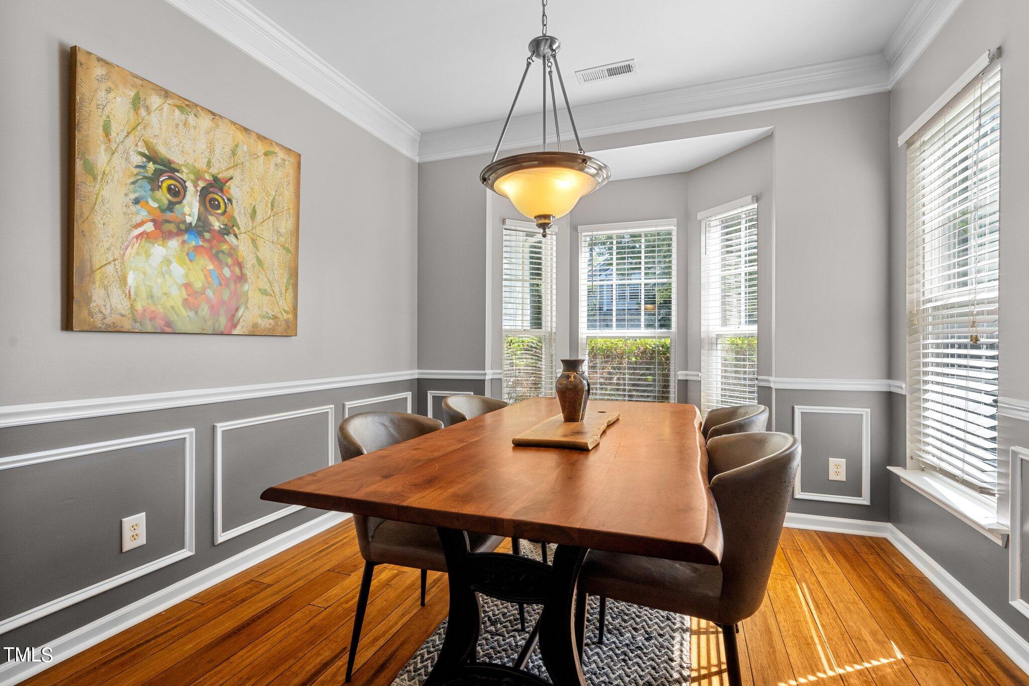 5016 Paperbark Court Durham, NC 27713 - Photo 4 of 35 a view of a dining room with furniture window and outside view