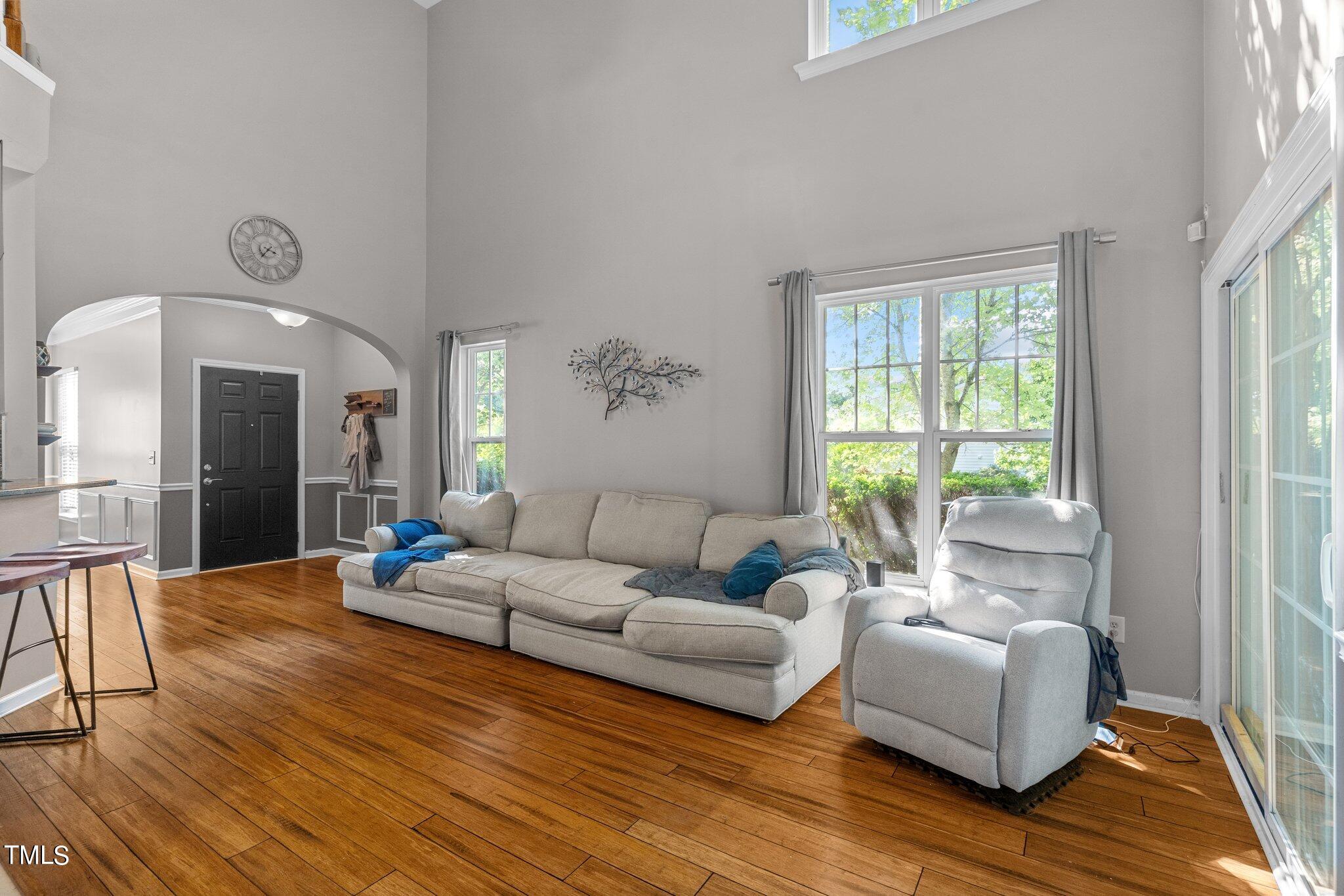 5016 Paperbark Court Durham, NC 27713 - Photo 7 of 35 a living room with furniture and a large window