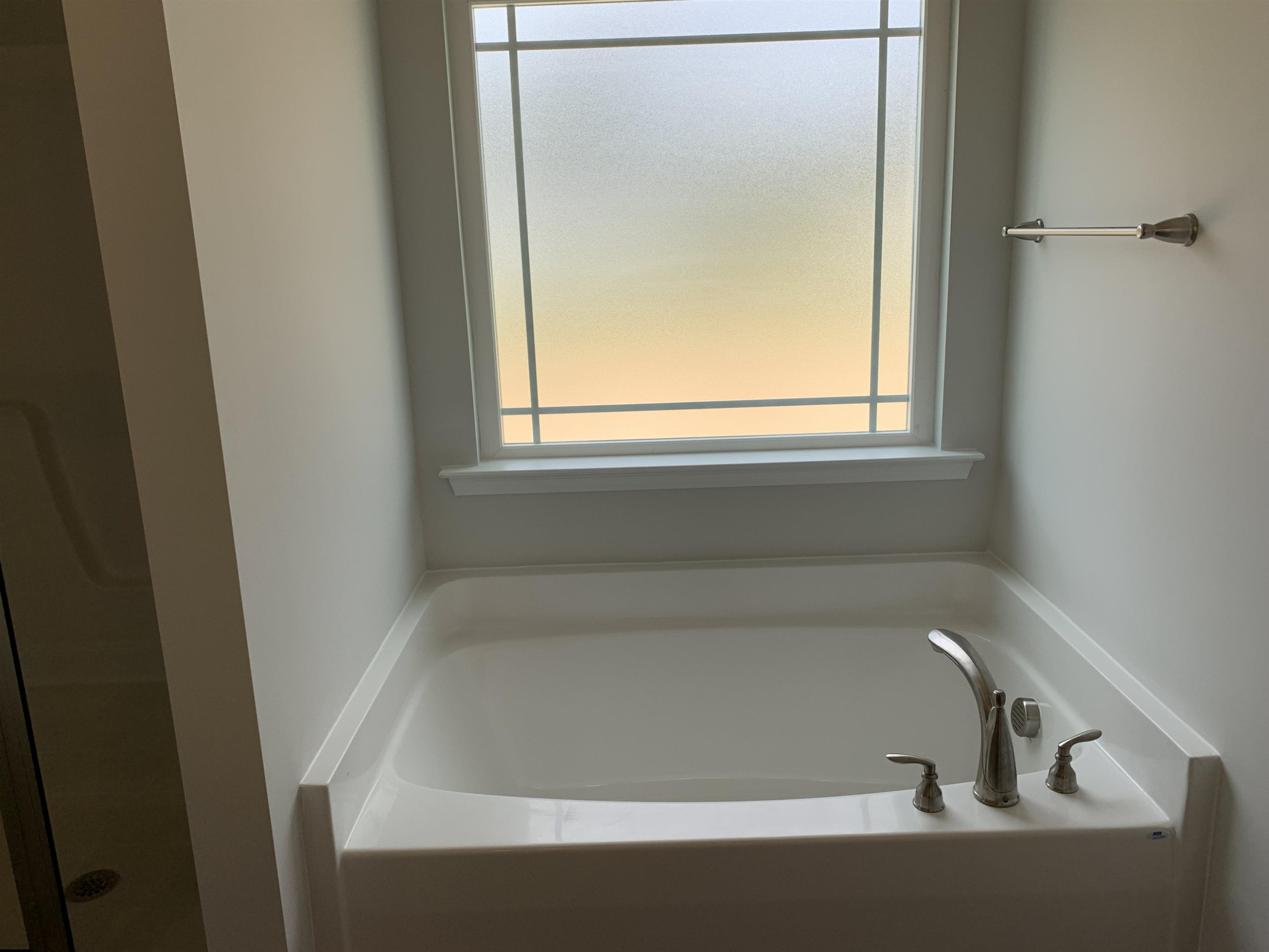 8433 Shallow Crk Trail Bailey, NC 27807 - Photo 13 of 17 a white bath tub sitting next to a window