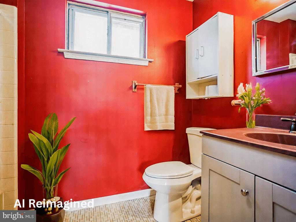 2674 Anthony Drive Colmar, PA 18915 - Photo 13 of 46 Vibrant red bathroom with modern accents.