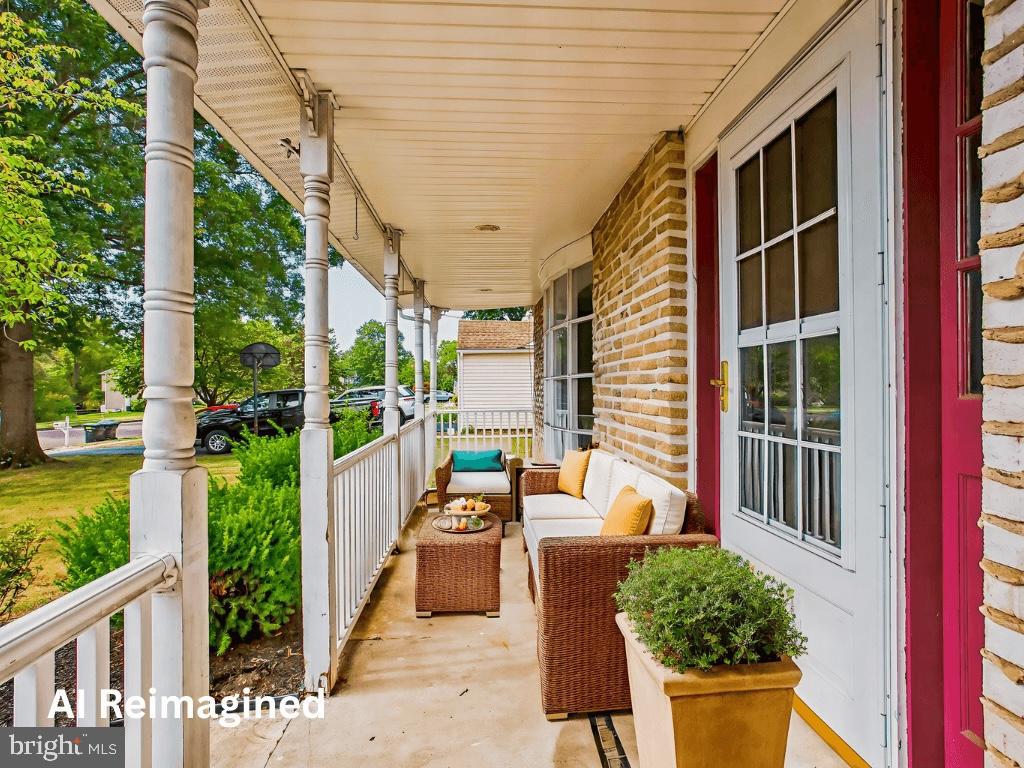 2674 Anthony Drive Colmar, PA 18915 - Photo 2 of 46 Charming porch with inviting greenery.