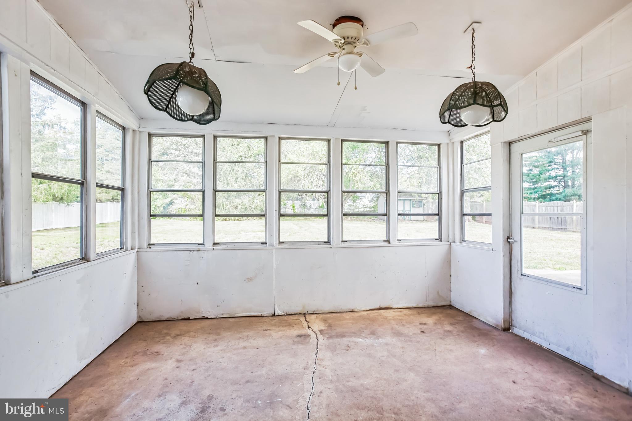 2674 Anthony Drive Colmar, PA 18915 - Photo 36 of 46 Bright and airy sunroom with scenic views.