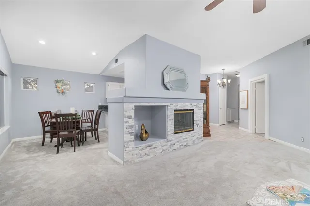 a view of a livingroom with furniture and a fireplace