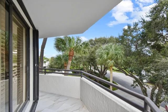 a view of balcony with furniture