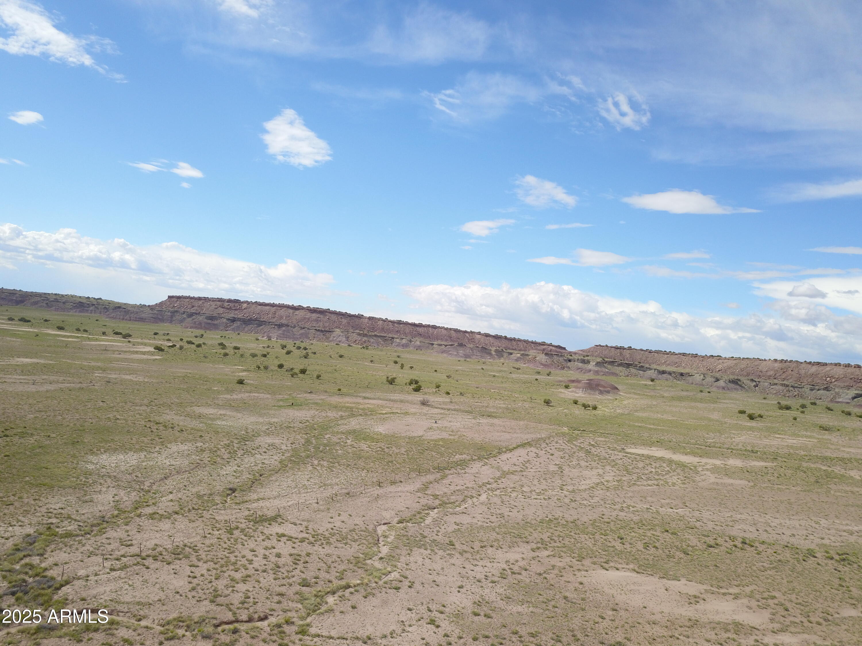49 County Road, Unit 314 St. Johns, AZ 85936 - Photo 4 of 10 a view of an ocean beach and mountain