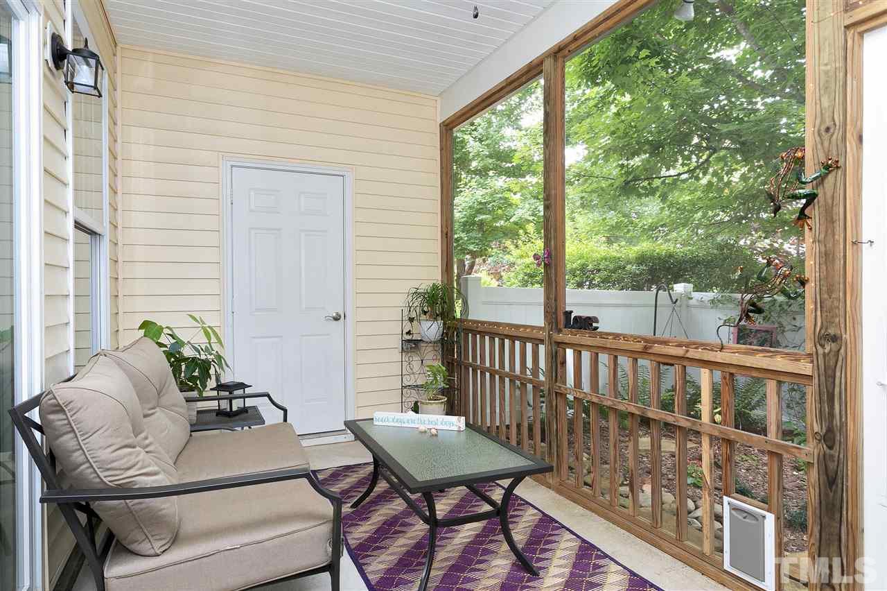 2408 Memory Ridge Drive Raleigh, NC 27606 - Photo 12 of 30 a balcony with furniture and a potted plant