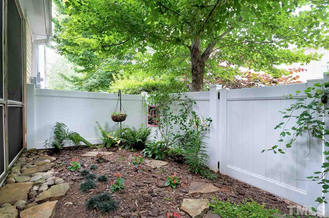 2408 Memory Ridge Drive Raleigh, NC 27606 - Photo 15 of 30 a view of a garden with plants