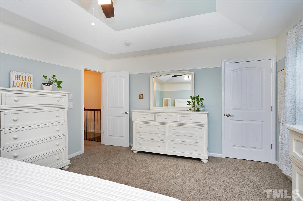 2408 Memory Ridge Drive Raleigh, NC 27606 - Photo 18 of 30 a room with a dresser in it