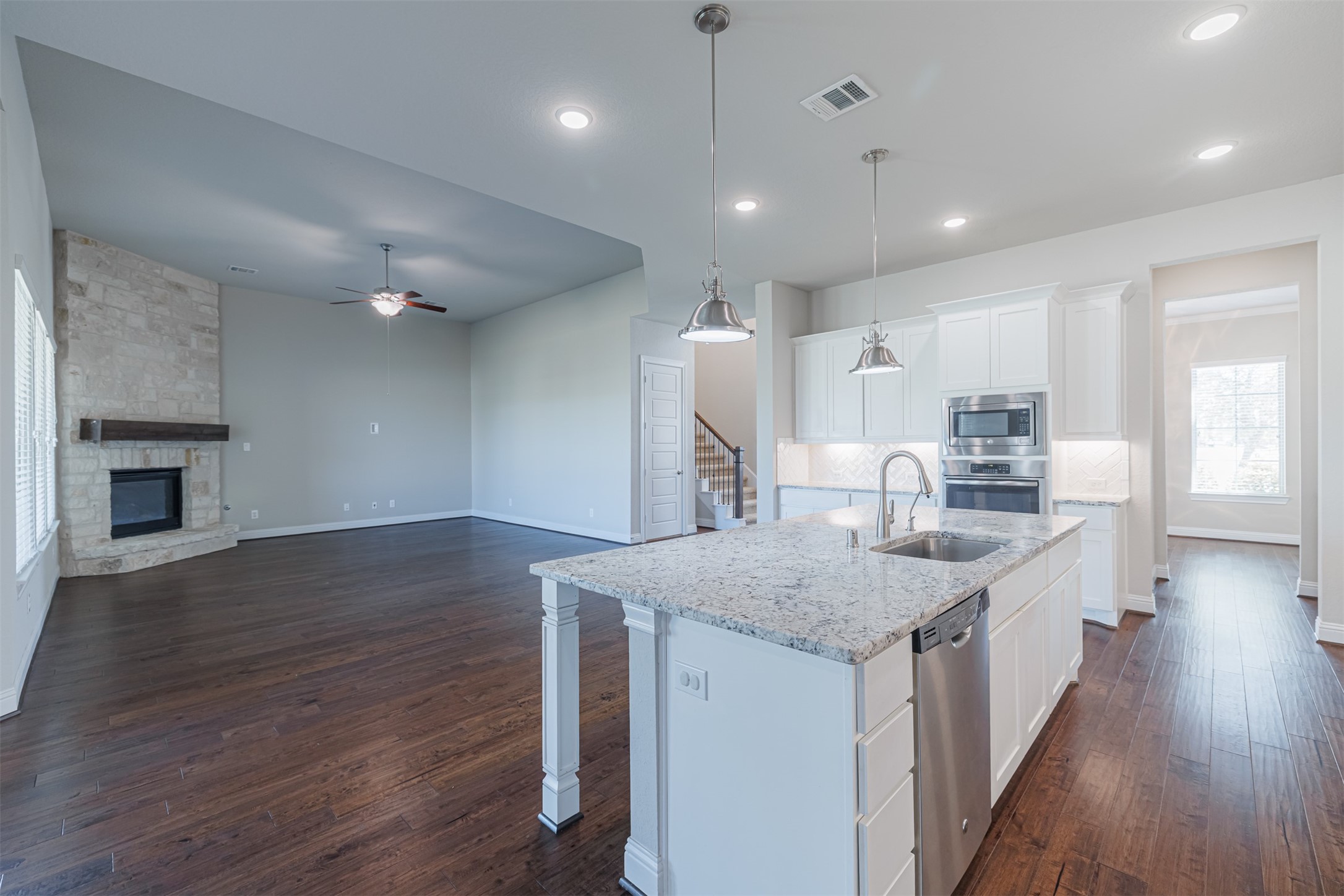 18731 Spellman Ridge Drive Tomball, TX 77377 - Photo 16 of 50 Kitchen is open to the family room.