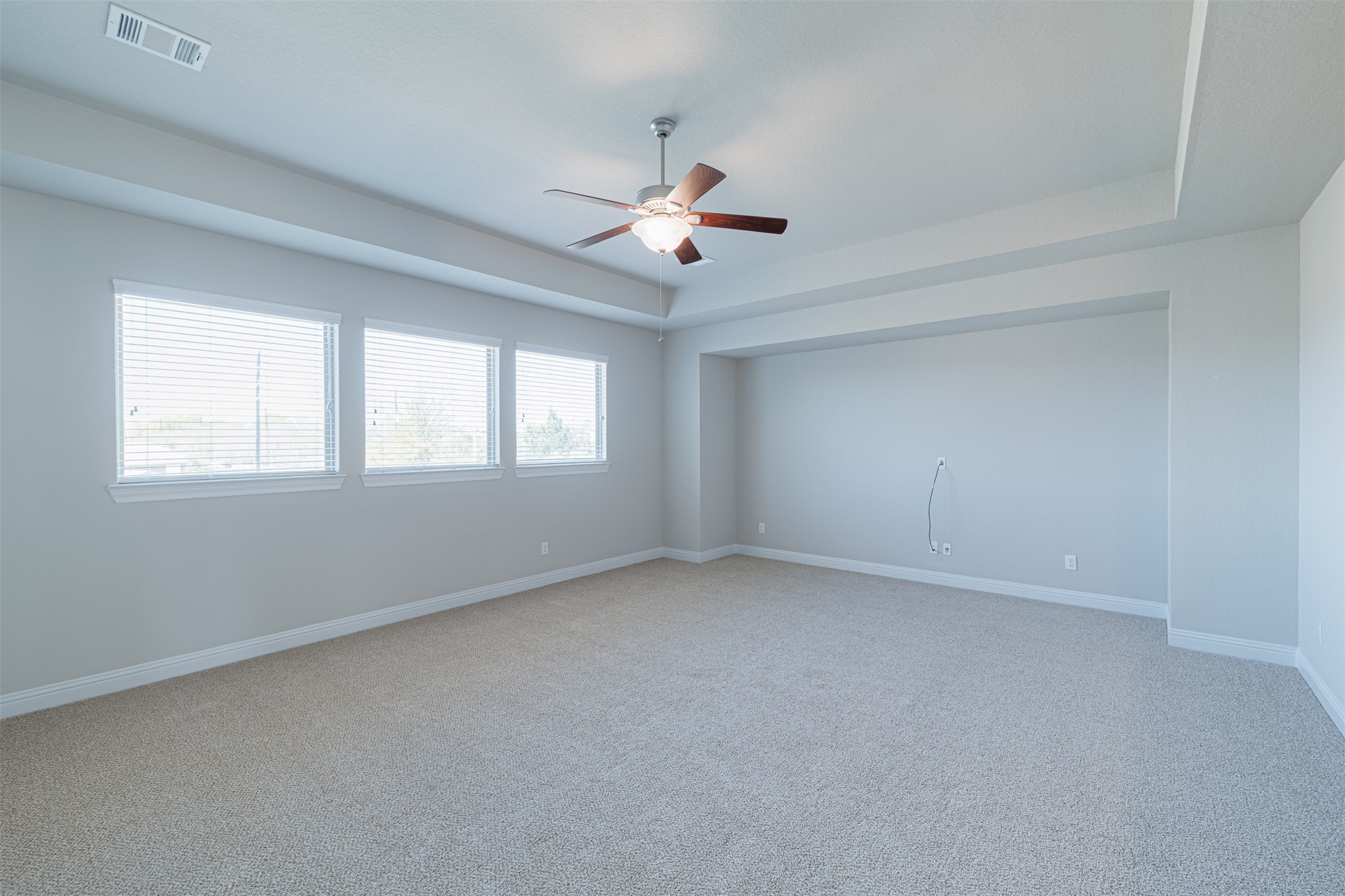 18731 Spellman Ridge Drive Tomball, TX 77377 - Photo 32 of 50 Large game room located upstairs with tray ceilings.