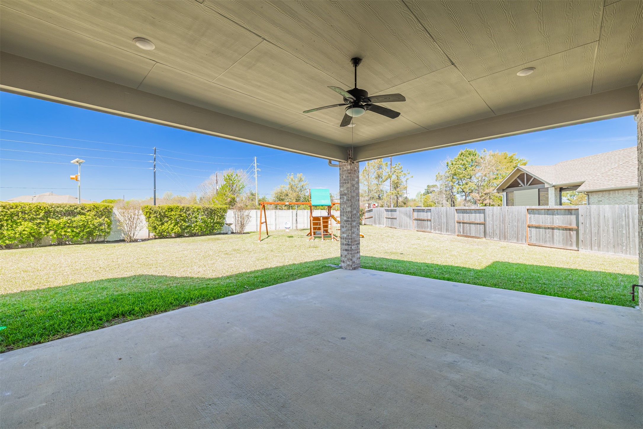 18731 Spellman Ridge Drive Tomball, TX 77377 - Photo 44 of 50 Large back covered patio with ceiling fan.