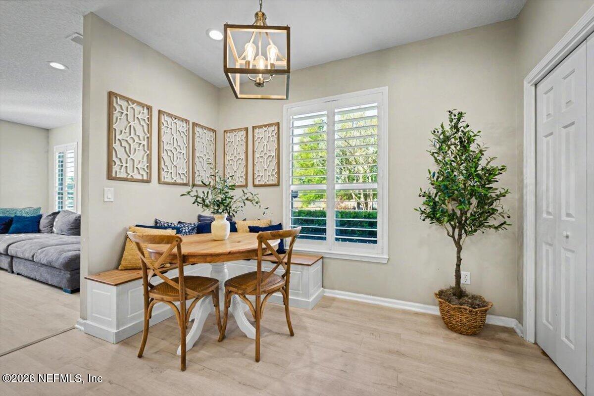 12683 Arrowleaf Lane Jacksonville, FL 32225 - Photo 14 of 52 a dining room with furniture and window