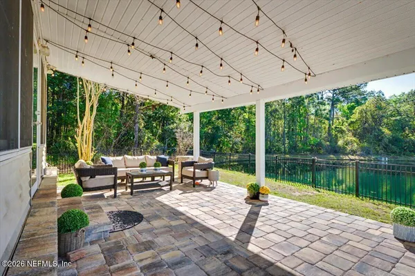 a workspace with furniture and wooden floor