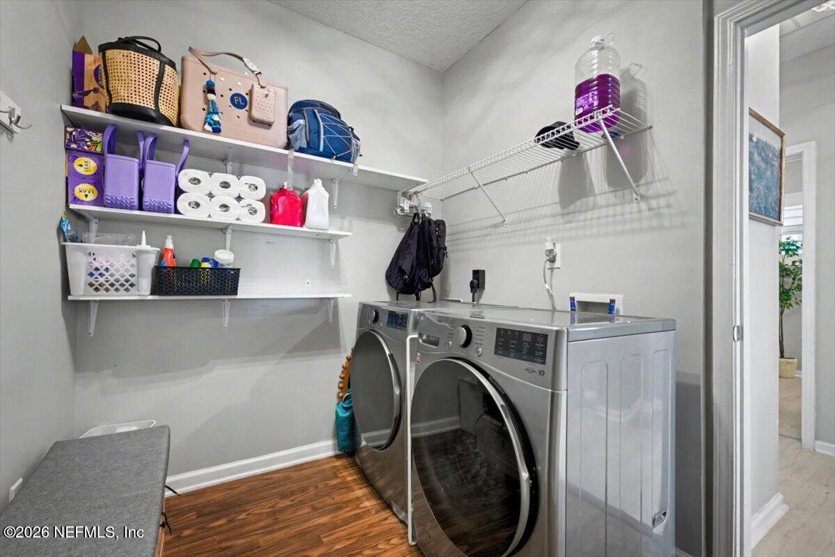 12683 Arrowleaf Lane Jacksonville, FL 32225 - Photo 29 of 52 a view of washer and dryer