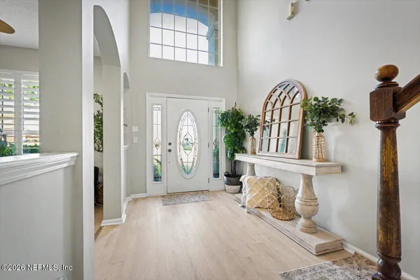 a view of front door and bedroom