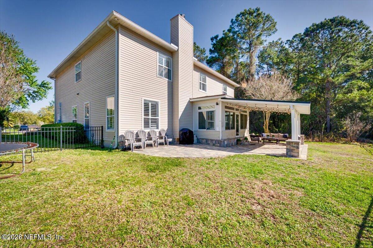 12683 Arrowleaf Lane Jacksonville, FL 32225 - Photo 49 of 52 a view of a house with swimming pool and sitting area