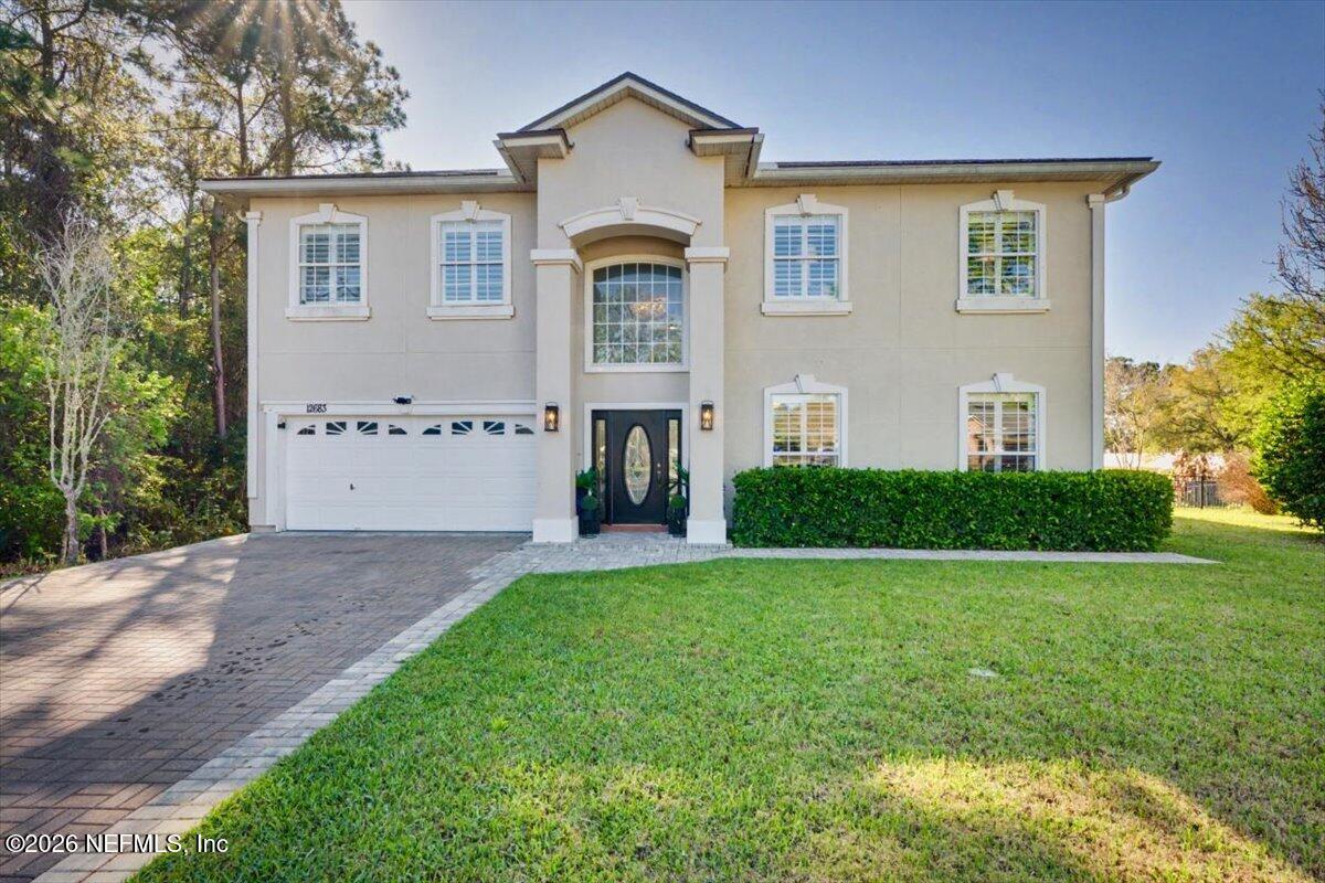 12683 Arrowleaf Lane Jacksonville, FL 32225 - Photo 52 of 52 a front view of a house with a yard