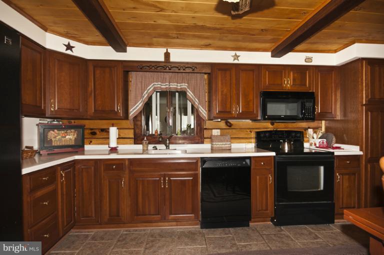 1720 East Deep Run Road Manchester, MD 21102 - Photo 13 of 30 a kitchen with a sink and cabinets