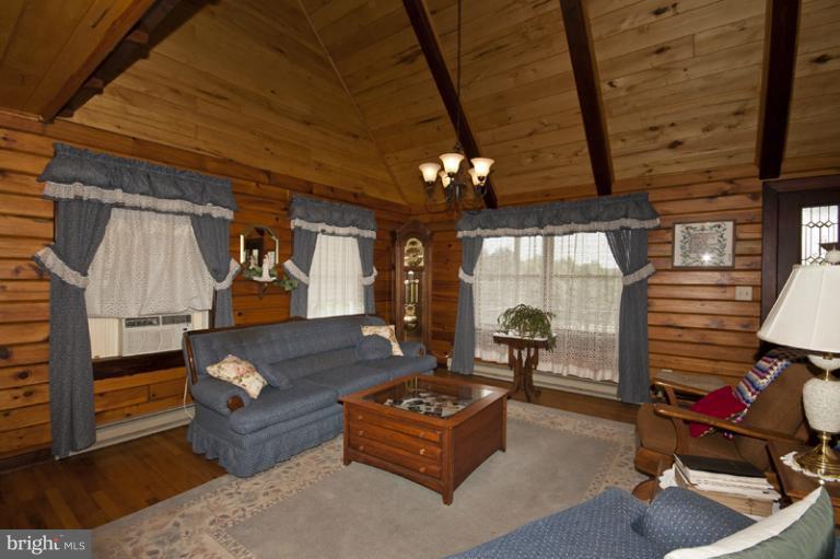 1720 East Deep Run Road Manchester, MD 21102 - Photo 15 of 30 a living room with furniture and a flat screen tv