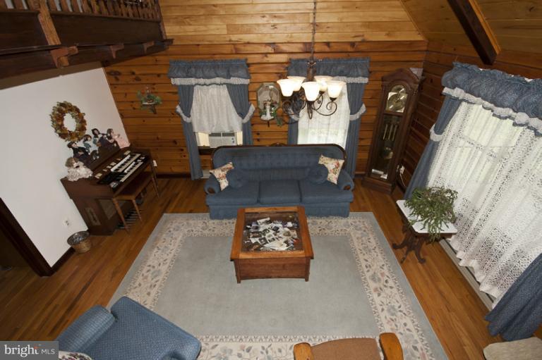 1720 East Deep Run Road Manchester, MD 21102 - Photo 16 of 30 a view of entryway and livingroom with furniture