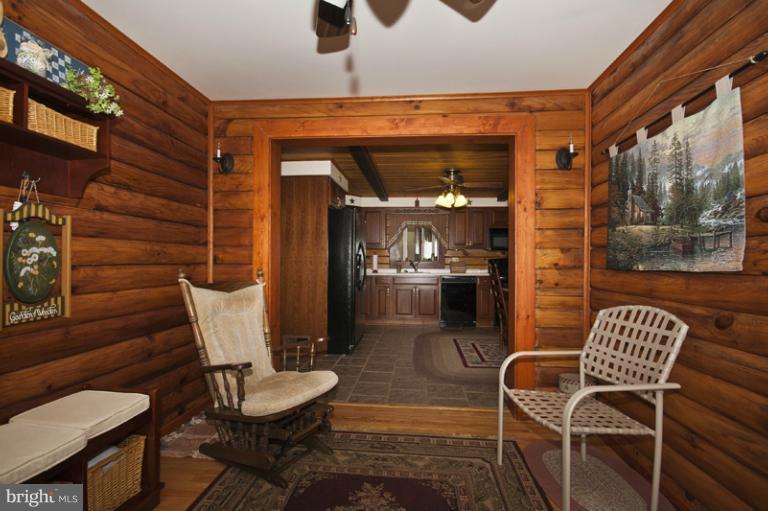 1720 East Deep Run Road Manchester, MD 21102 - Photo 18 of 30 a living room with furniture and a painting on the wall