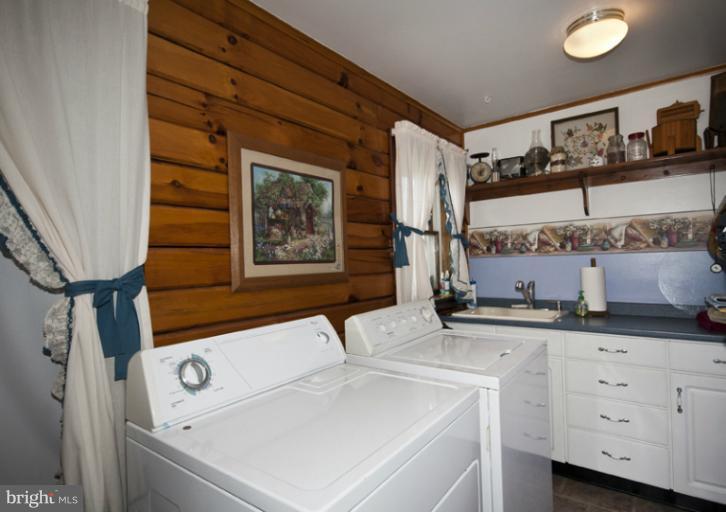 1720 East Deep Run Road Manchester, MD 21102 - Photo 19 of 30 a view of hallway with washer and dryer