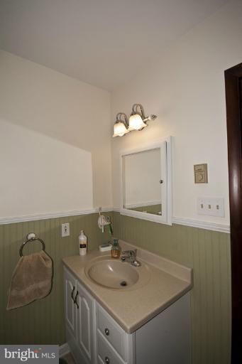 1720 East Deep Run Road Manchester, MD 21102 - Photo 20 of 30 a bathroom with a sink and a mirror