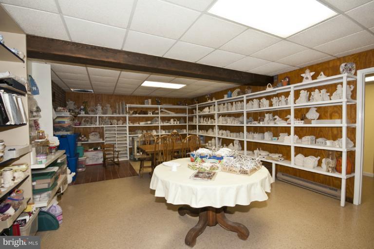 1720 East Deep Run Road Manchester, MD 21102 - Photo 25 of 30 a view of a workspace with furniture