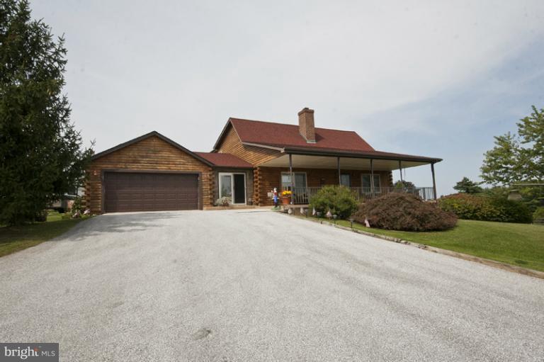 1720 East Deep Run Road Manchester, MD 21102 - Photo 27 of 30 a front view of a house with garden