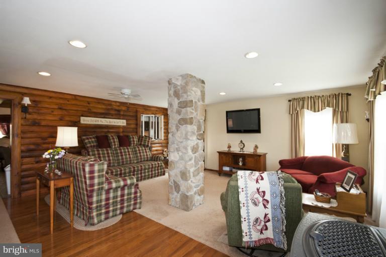 1720 East Deep Run Road Manchester, MD 21102 - Photo 9 of 30 a living room with furniture and flat screen tv