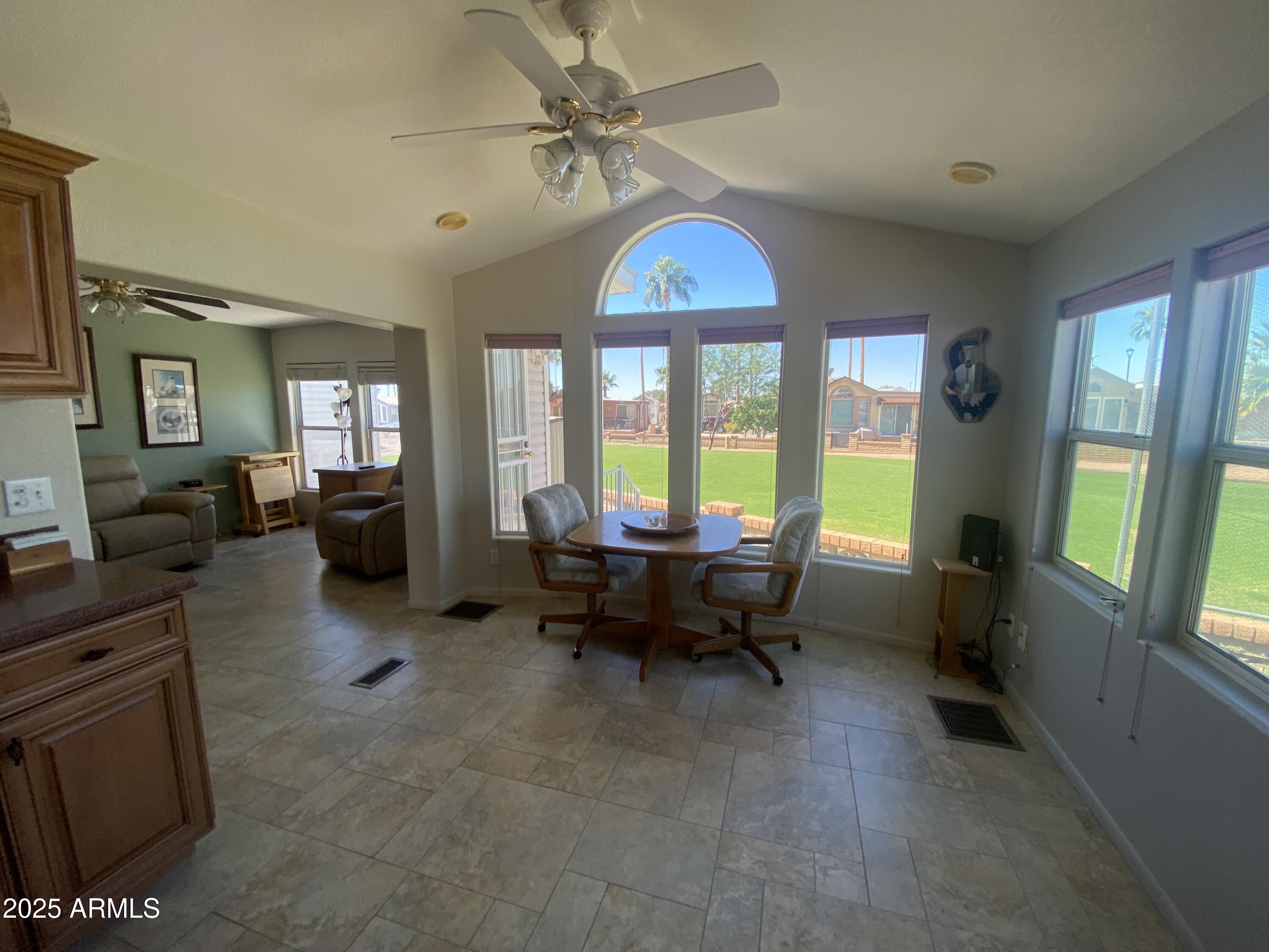 2239 West San Juan Circle Apache Junction, AZ 85119 - Photo 11 of 37 a living room with furniture and a window