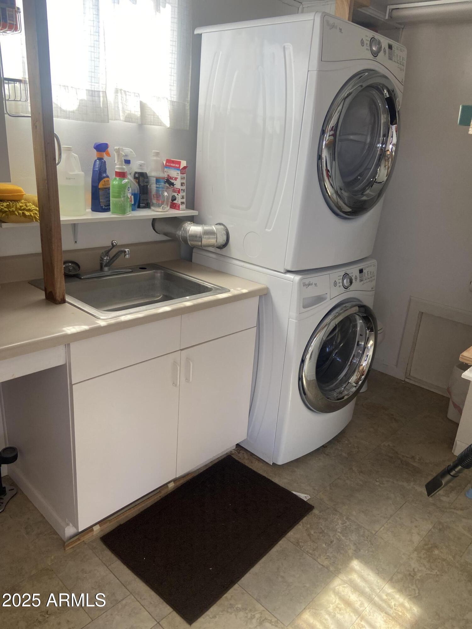 2239 West San Juan Circle Apache Junction, AZ 85119 - Photo 28 of 37 a utility room with dryer and washer