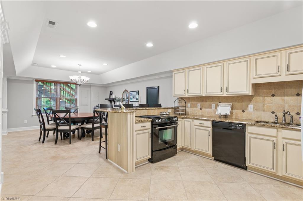 8505 Case Ridge Drive Oak Ridge, NC 27310 - Photo 31 of 43 Second full kitchen in basement