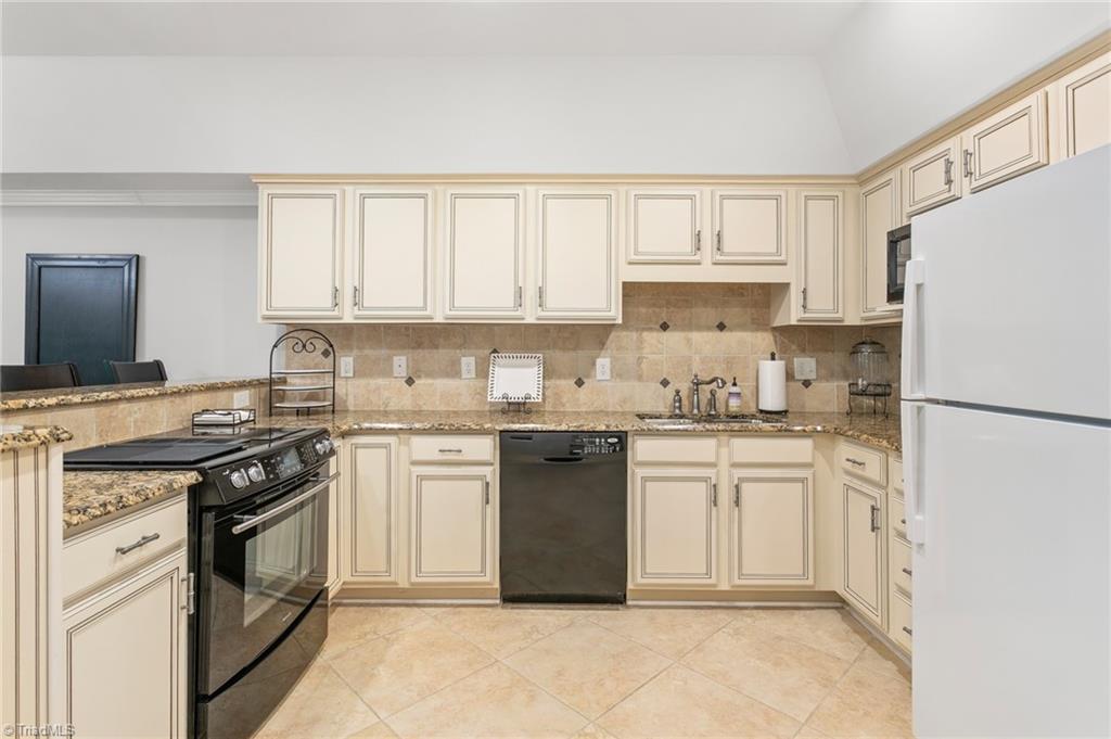 8505 Case Ridge Drive Oak Ridge, NC 27310 - Photo 32 of 43 Basement kitchen 2
