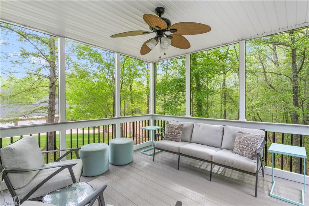 8505 Case Ridge Drive Oak Ridge, NC 27310 - Photo 9 of 43 Relax inside the screened-in porch