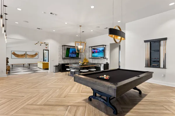 a kitchen with stainless steel appliances granite countertop a stove and a sink