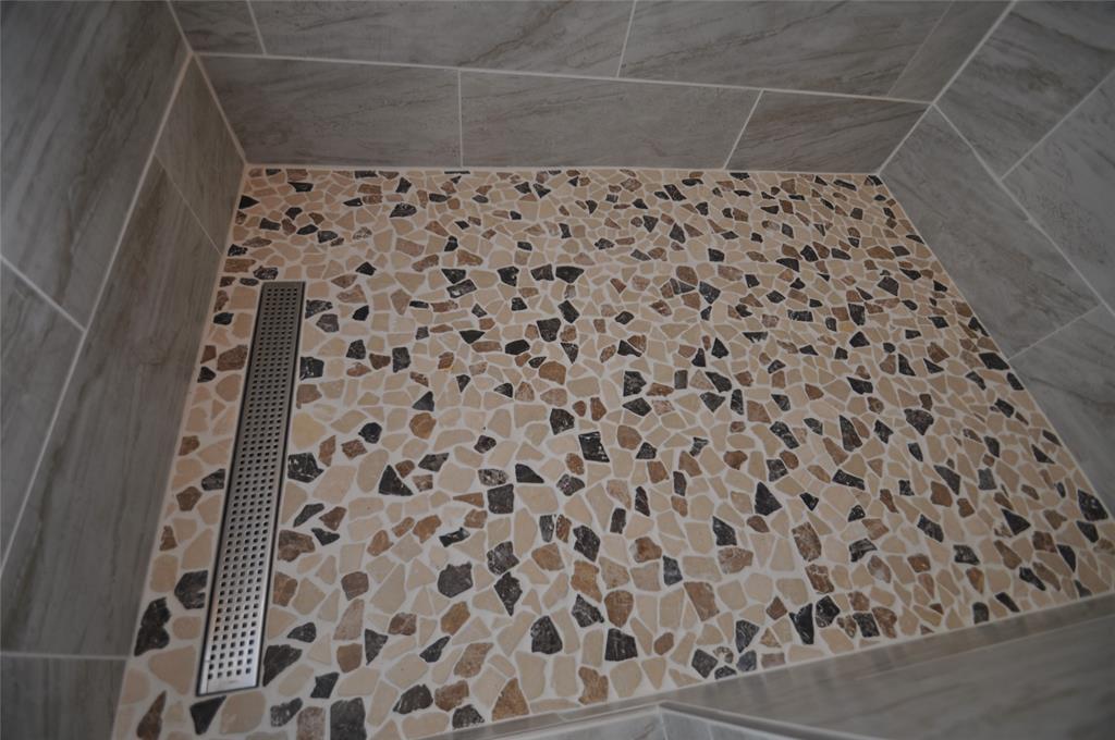 209 West 5th Street Tolar, TX 76476 - Photo 10 of 11 a bathroom with a shower