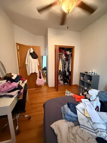 a living room with furniture a rug and a chandelier