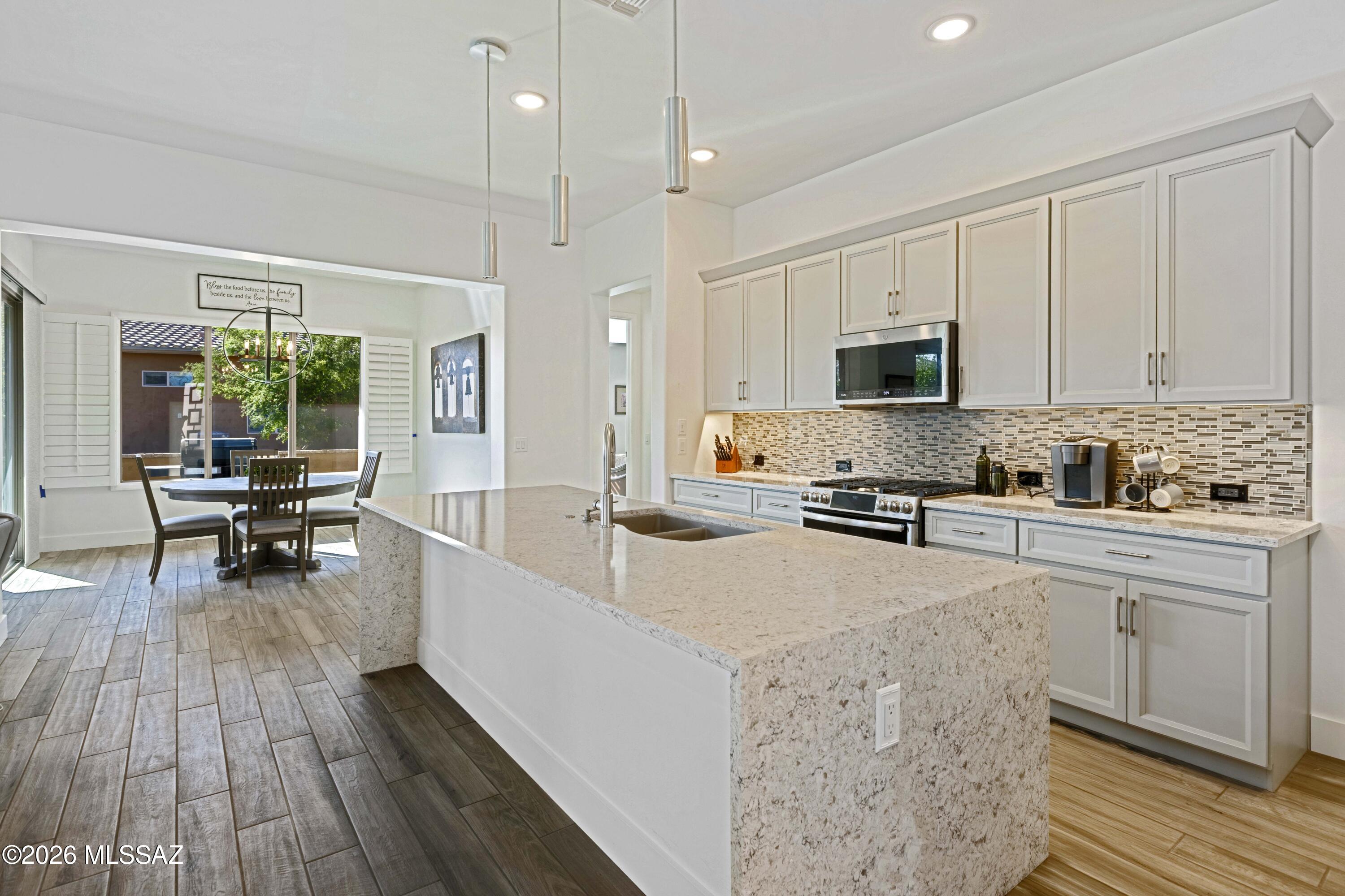 61347 East Shale Road Oracle, AZ 85623 - Photo 4 of 40 upgraded kitchen waterfall island
